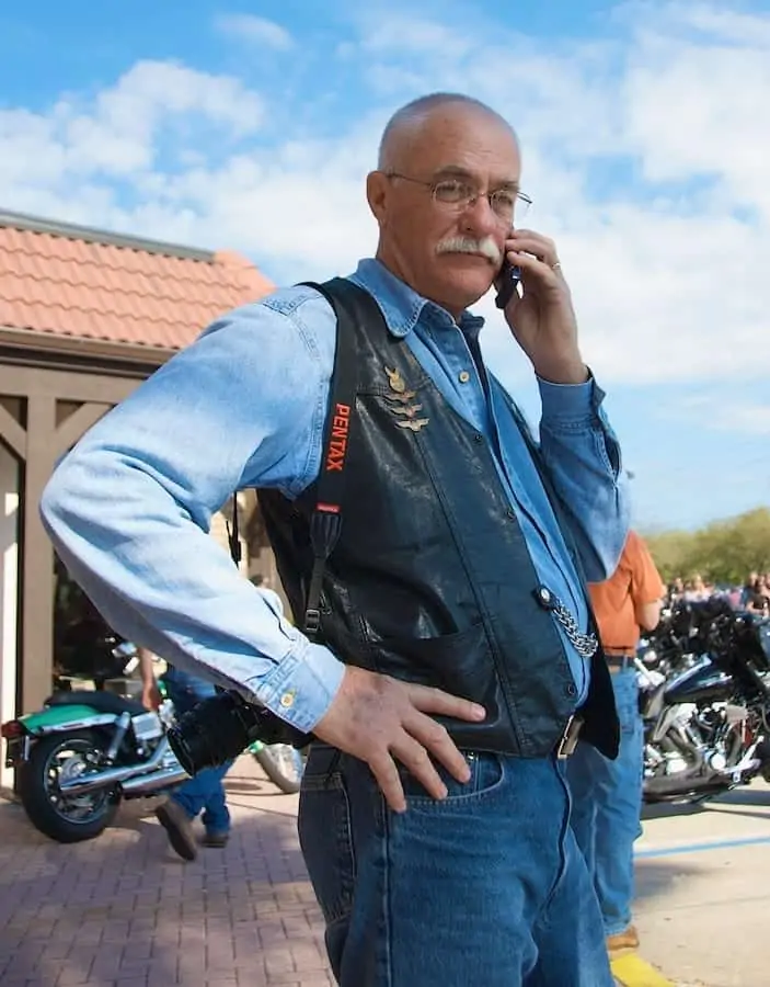Portrait of biker at Daytona Bike Week on cell phone
